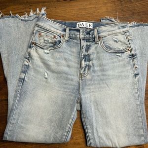 Brand: Daze, Size 26, lighter wash, distressed in areas shown